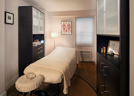 Manhattan Acupuncture Massage Therapy, Massage Therapist bed